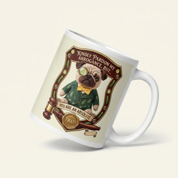 A funny graphic on a ceramic mug featuring Sir Cucumber Dog inside an ornate wooden crest. Below him is a judge's gavel and a gold seal. Text reads: KINDLY PARDON MY ARROGANCE, BUT... YOU ARE AN ABSOLUTE TWAT!