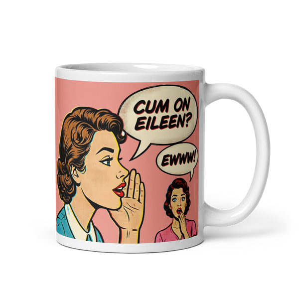A pop art comic style illustration on a white ceramic mug. A woman with vintage styled brown hair in a blue shirt whispers the phrase CUM ON EILEEN? into a speech bubble. In the background, a second woman in a pink shirt looks shocked with her hand over her mouth, and her speech bubble says EWWW!. The design features a 1950s aesthetic with classic comic book Ben Day dots.