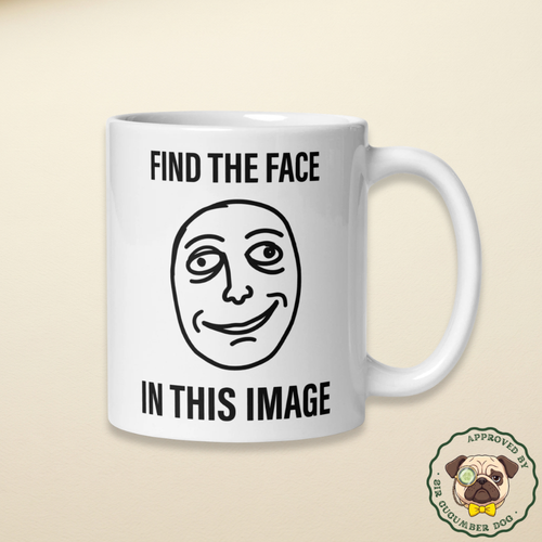 Find the face in this image with an image of the face in the middle on a white mug
