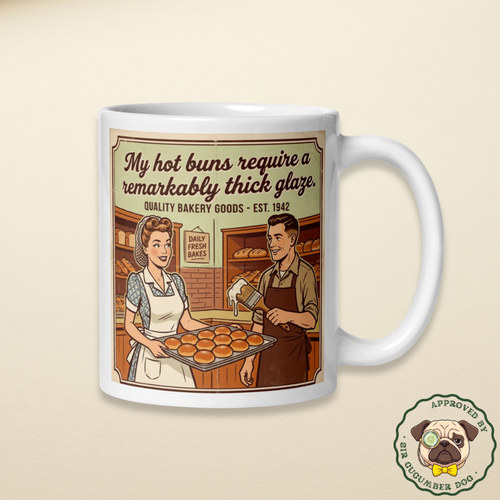 Vintage 1940s style illustration on a ceramic mug of a smiling female baker holding a tray of round buns next to a male baker holding a large brush dripping with white icing. The bold text above them reads My hot buns require a remarkably thick glaze. Quality Bakery Goods Est. 1942.
