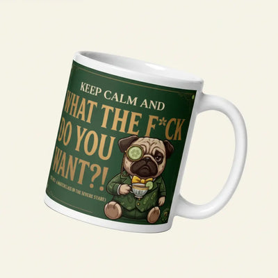 A funny, elegant graphic on a dark green textured background with a gold border. Features a pug named Sir Cucumber Dog wearing a monocle and suit, holding a teacup next to the text KEEP CALM AND WHAT THE F*CK DO YOU WANT?! (EST. 1823 - A MASTERCLASS IN THE SEVERE STARE). 11 oz