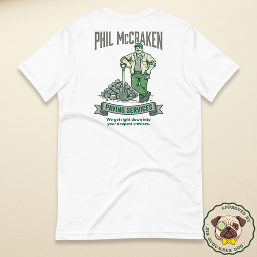 A vintage illustration of a male paving contractor leaning on a shovel next to a pile of cobblestones, featuring the text Phil McCraken Paving Services printed on the back of a white t-shirt.