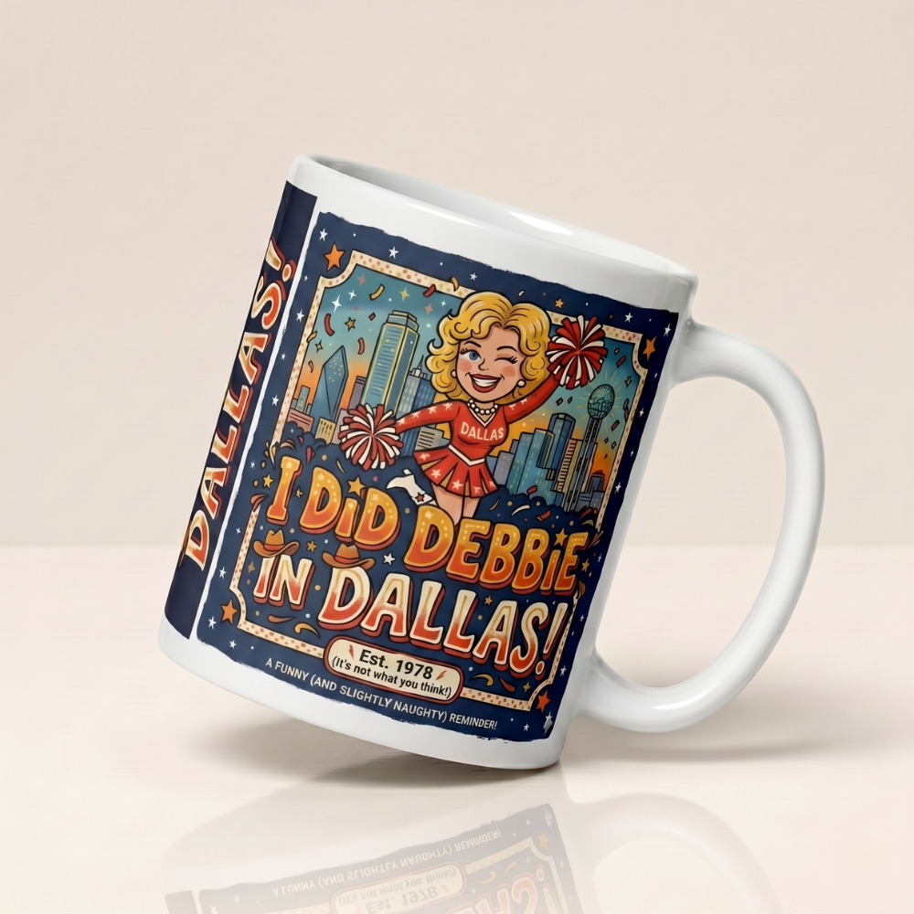 A white ceramic mug featuring a retro, 1970s-style cartoon illustration of a blonde cheerleader in a red and white Dallas uniform holding pom-poms. Large, vintage-style orange and yellow text reads I DID DEBBIE IN DALLAS! with a subtext that says Est. 1978 (It's not what you think!) and A FUNNY (AND SLIGHTLY NAUGHTY) REMINDER!. The background shows a stylized Dallas city skyline with stars and confetti under a dark blue sky.