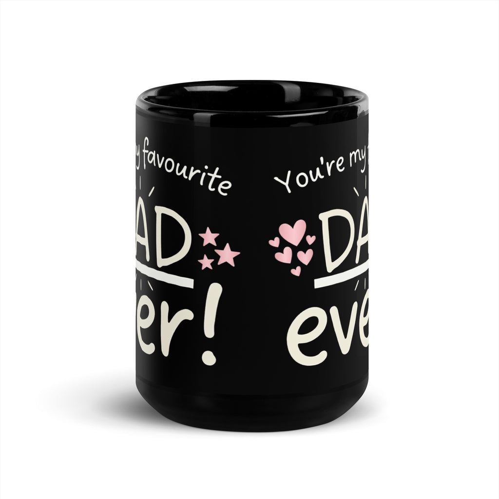 A black ceramic mug on a white background. The design features white hand drawn typography that reads YOU RE MY FAVOURITE DAD EVER!. Small pink hearts decorate the left side of the text and three pink stars are on the right side. The word DAD is underlined and in a larger font. 15oz