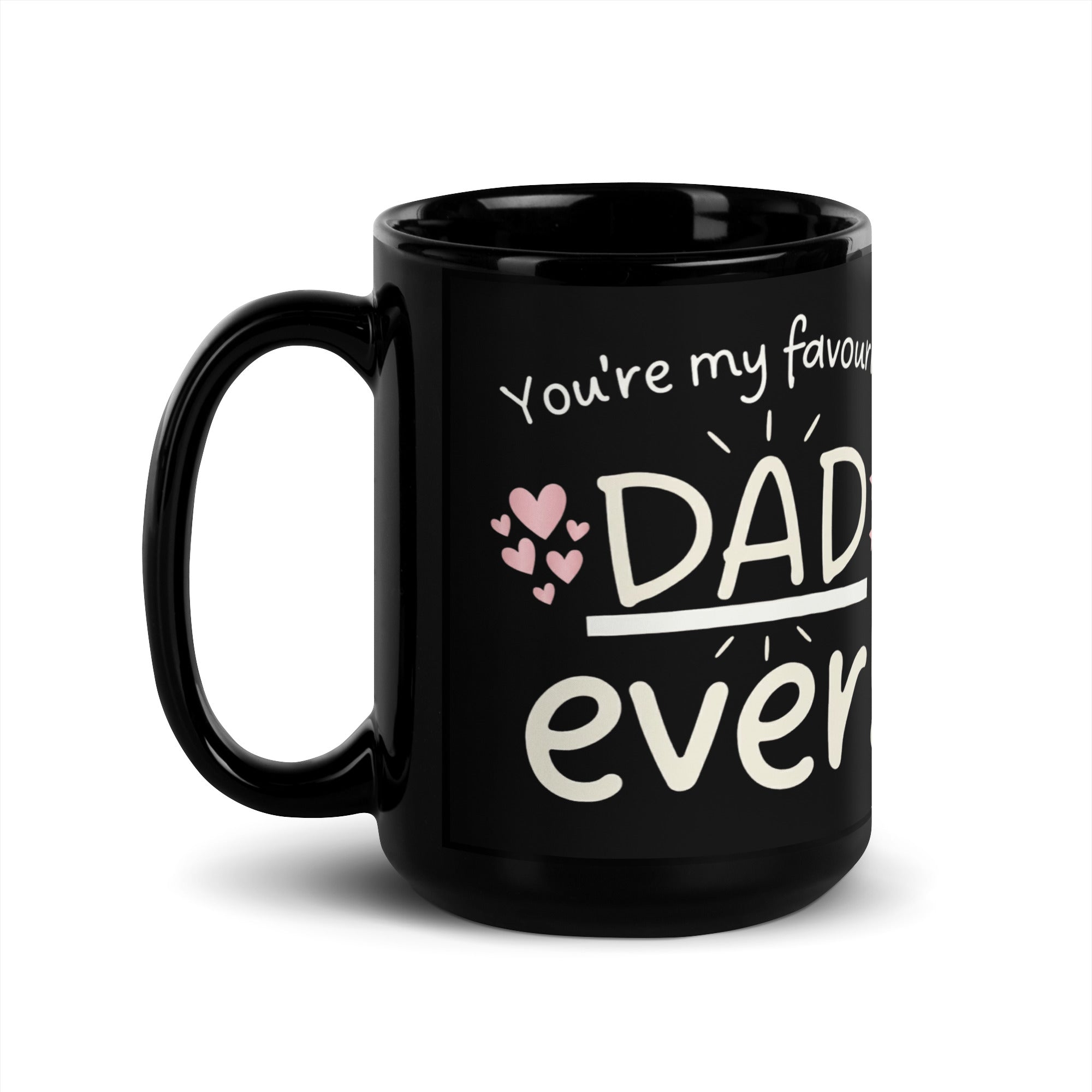A black ceramic mug on a white background. The design features white hand drawn typography that reads YOU RE MY FAVOURITE DAD EVER!. Small pink hearts decorate the left side of the text and three pink stars are on the right side. The word DAD is underlined and in a larger font. 15oz