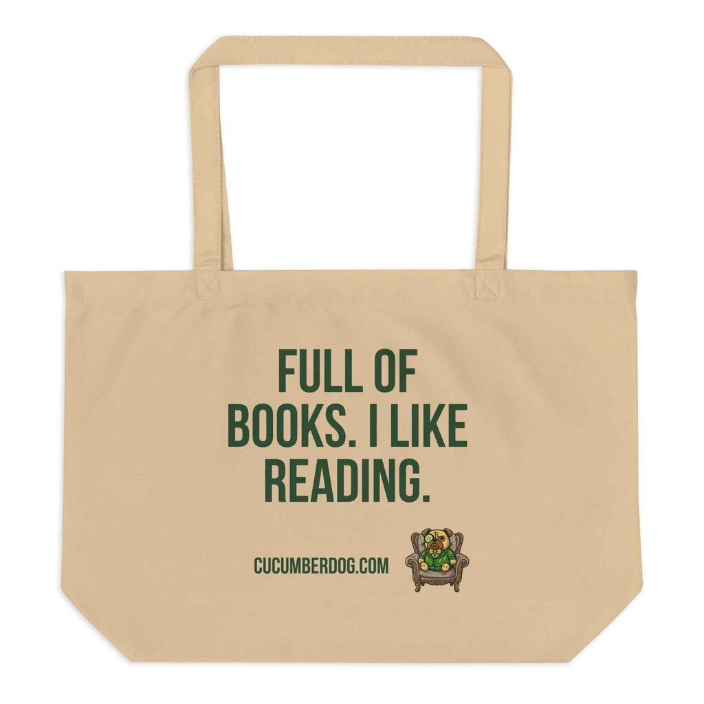 A heavy duty oyster coloured organic cotton tote bag featuring bold Cucumber green text that reads FULL OF BOOKS. I LIKE READING. Below the text is the website CUCUMBERDOG.COM and a small illustration of Sir Cucumber Dog, a pug wearing a green cucumber print suit and monocle, sitting in a dapper armchair.