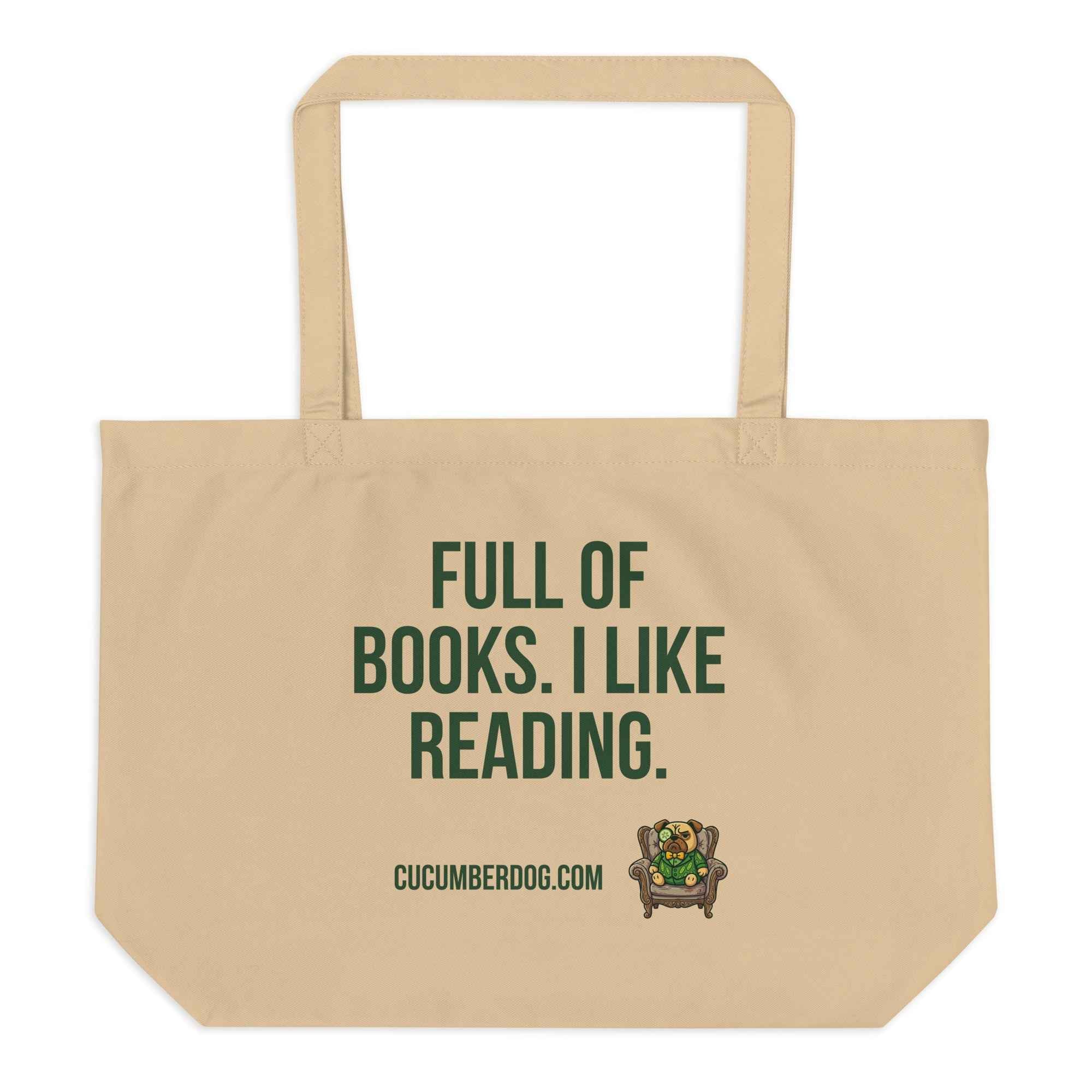 A heavy duty oyster coloured organic cotton tote bag featuring bold Cucumber green text that reads FULL OF BOOKS. I LIKE READING. Below the text is the website CUCUMBERDOG.COM and a small illustration of Sir Cucumber Dog, a pug wearing a green cucumber print suit and monocle, sitting in a dapper armchair.