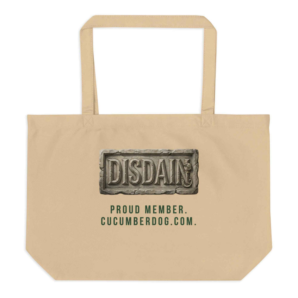 A heavy duty oyster organic cotton tote bag featuring a black rectangular print. Inside the black area is a realistic 3D stone carving of the word DISDAIN with Sir Cucumber Dog's profile hidden in the letter N. Green text below reads PROUD MEMBER CUCUMBERDOG.COM.