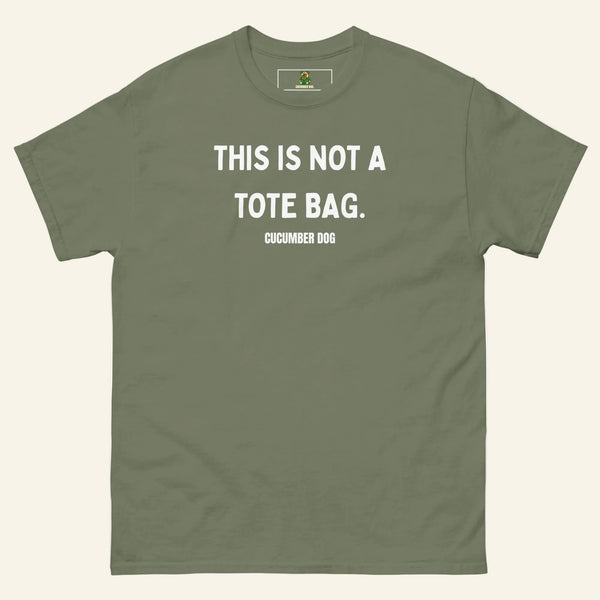 Green t-shirt with the words This Is Not A Tote Bag in white text on a white background. Cucumber Dog