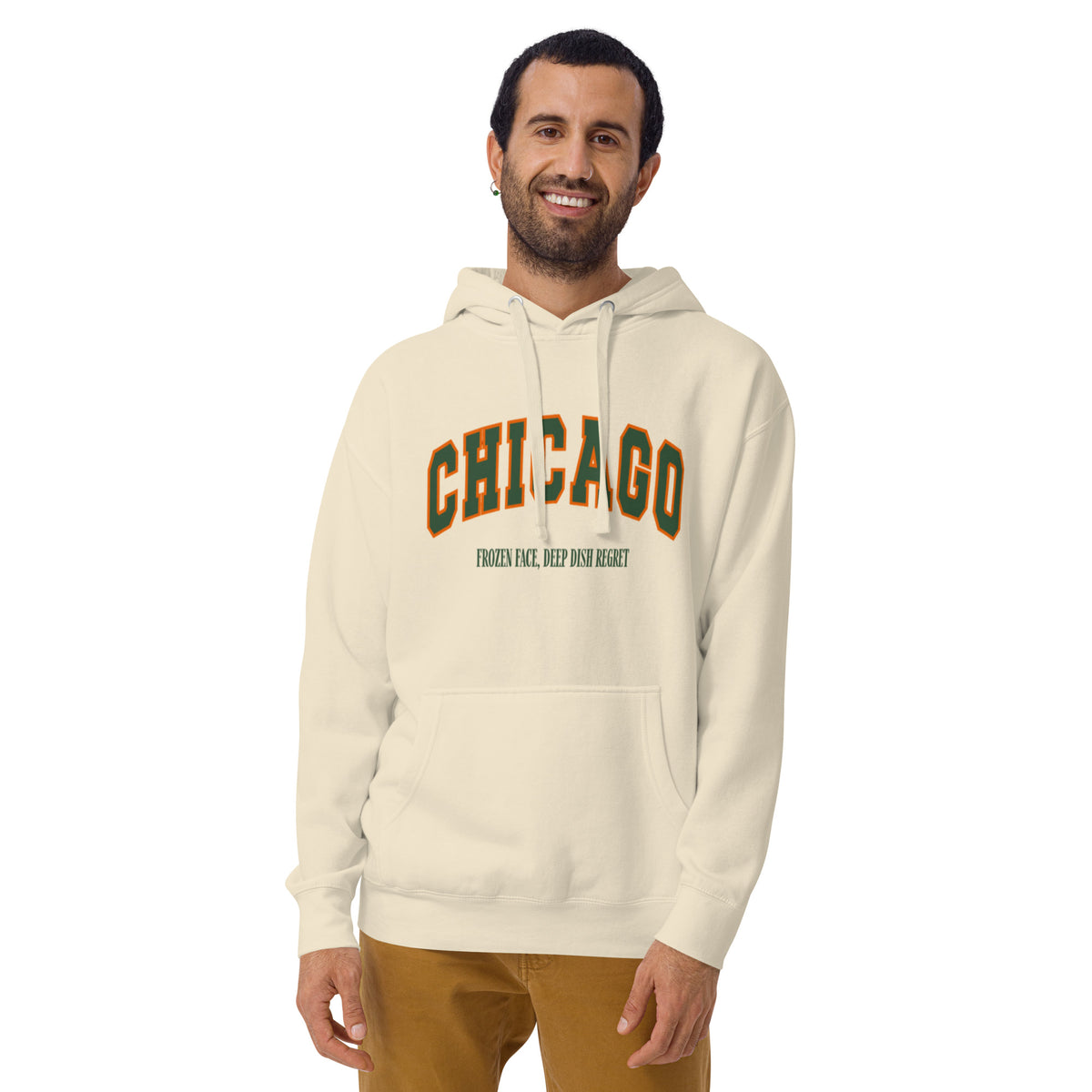 Bone hoodie featuring a vintage athletic graphic with arched Chicago text in green and orange, and the phrase Frozen Face, Deep Dish Regret underneath in a green serif font.