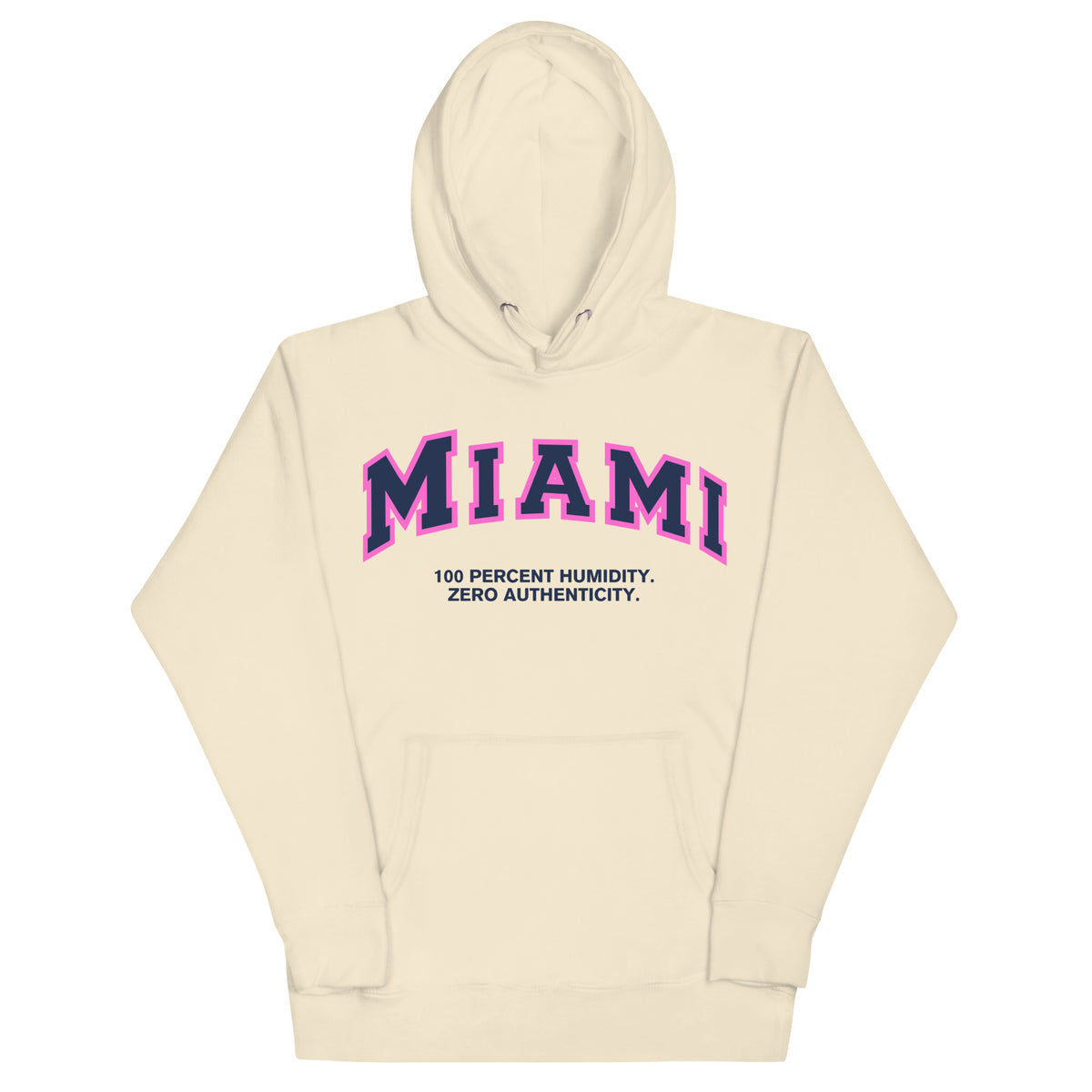 Premium bone coloured hoodie featuring a vintage athletic graphic with arched Miami text in dark blue and pink, and the phrase 100 Percent Humidity Zero Authenticity printed underneath in a solid black serif font.