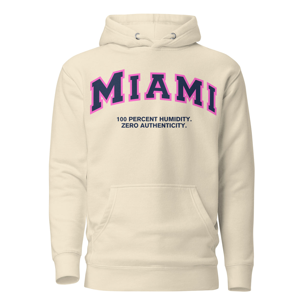 Premium bone coloured hoodie featuring a vintage athletic graphic with arched Miami text in dark blue and pink, and the phrase 100 Percent Humidity Zero Authenticity printed underneath in a solid black serif font.