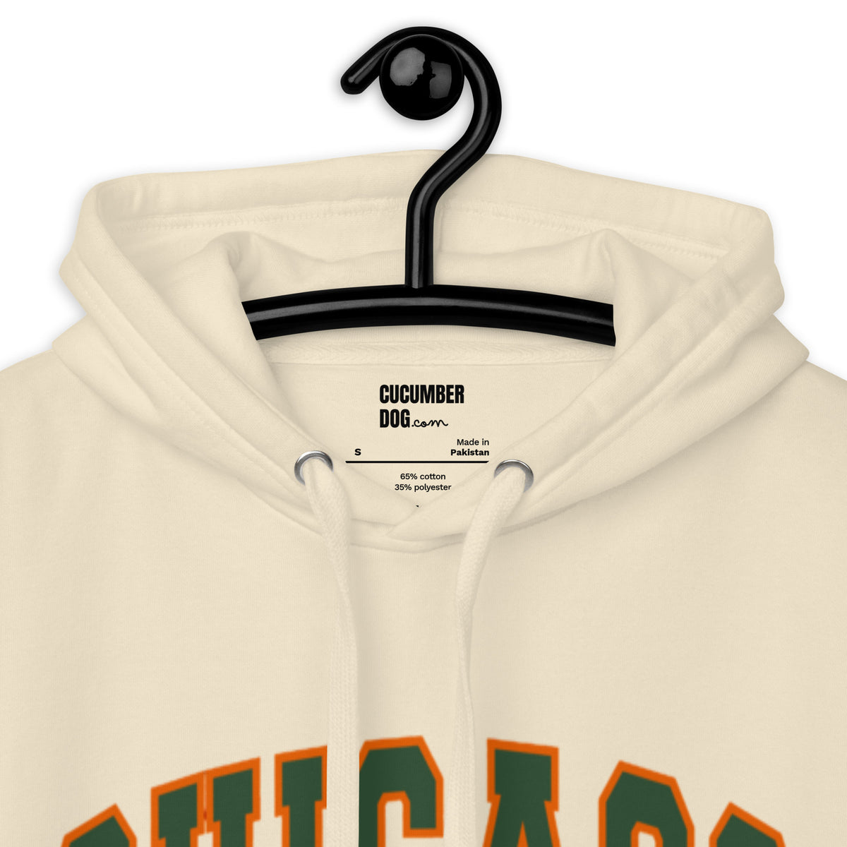 Bone hoodie featuring a vintage athletic graphic with arched Chicago text in green and orange, and the phrase Frozen Face, Deep Dish Regret underneath in a green serif font.