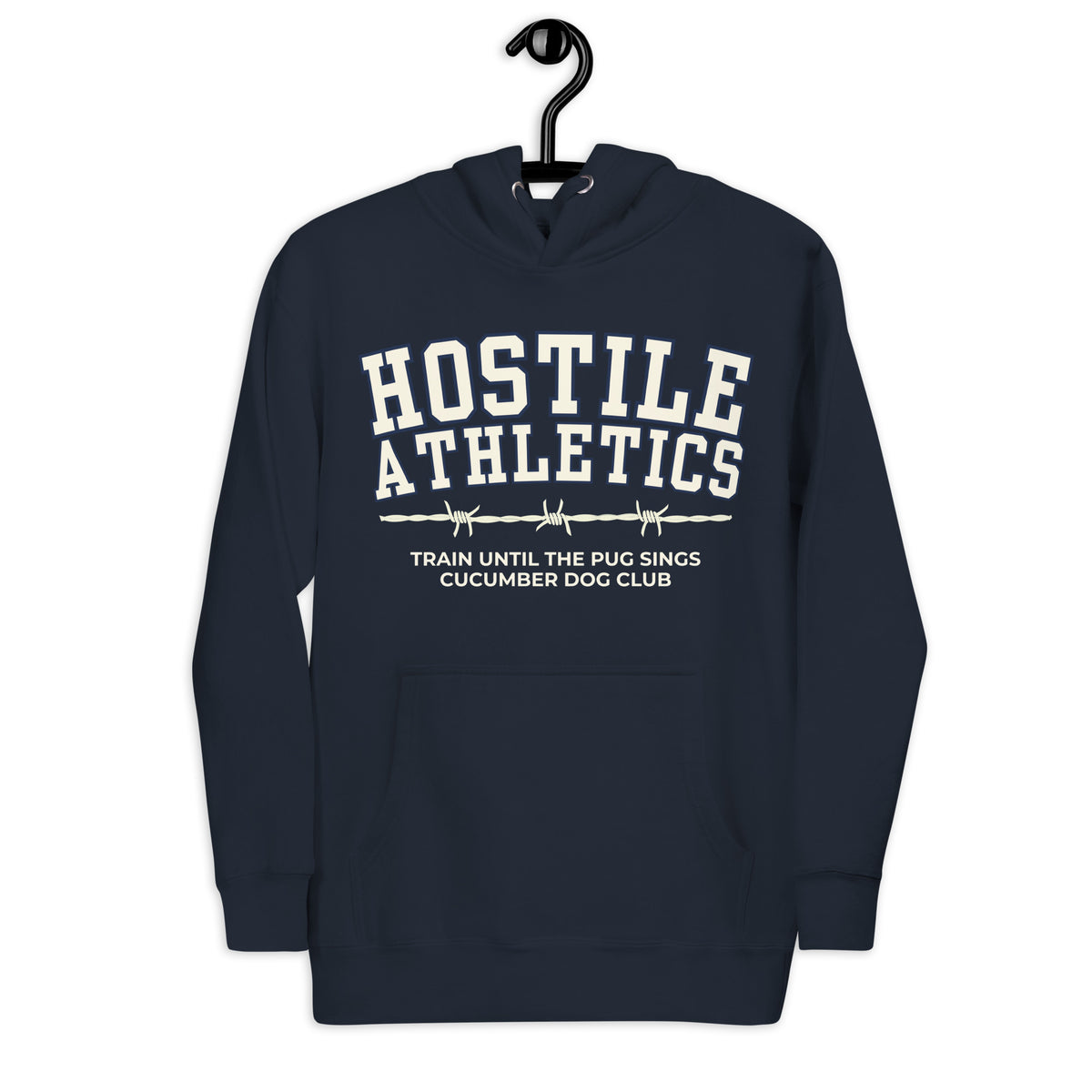 Premium navy blue hoodie featuring a vintage athletic graphic with arched Hostile Athletics text in white, a barbed wire motif, and text reading Train Until The Pug Sings and Cucumber Dog Club.
