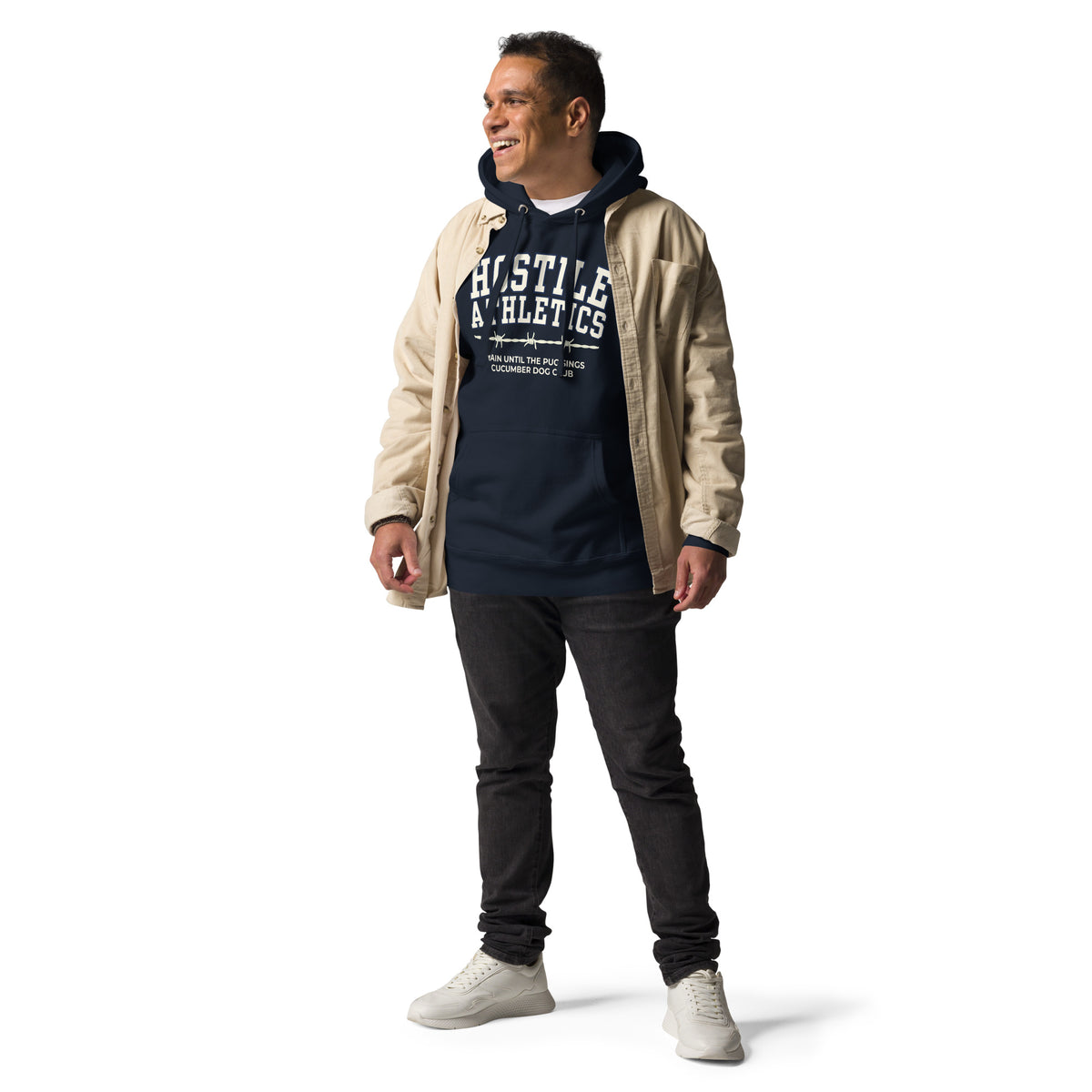 Premium navy blue hoodie featuring a vintage athletic graphic with arched Hostile Athletics text in white, a barbed wire motif, and text reading Train Until The Pug Sings and Cucumber Dog Club.