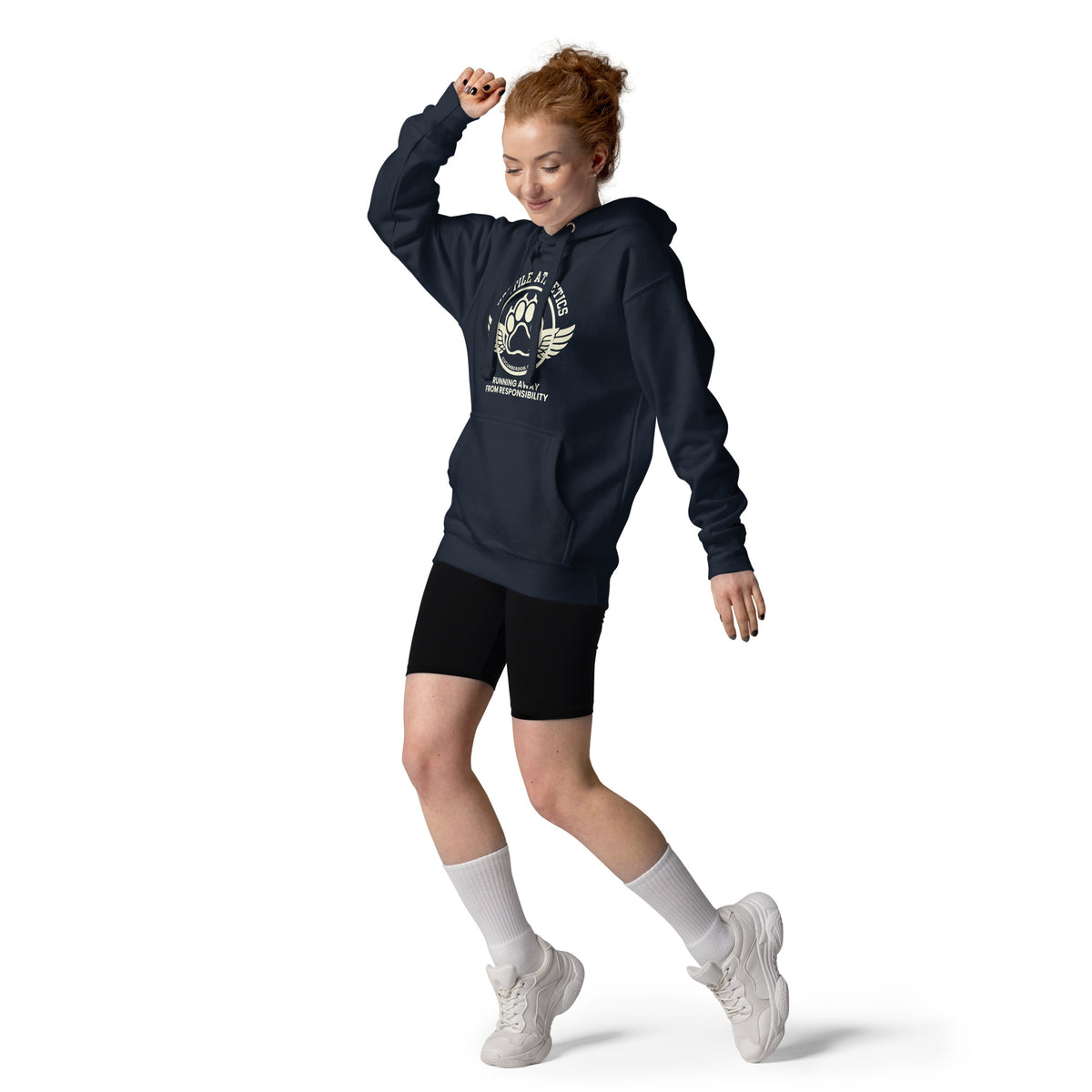 Premium navy blue hoodie featuring a winged collegiate athletic graphic with arched Hostile Athletics text, a central paw print emblem with cucumberdog.com, and the phrase Running Away From Responsibility printed underneath.