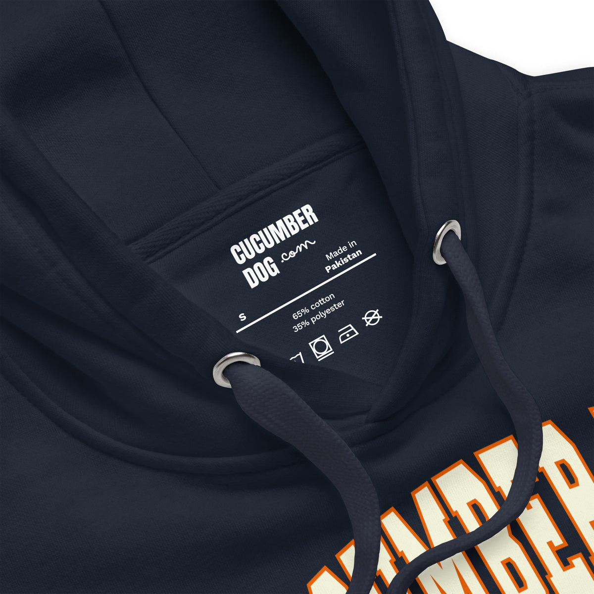 Premium navy blue hoodie featuring a vintage athletic graphic with arched Cucumber Dog and Athletics Dept text in white block typography with an orange outline, above Est. 1987 and a track motif framing the CD monogram.
