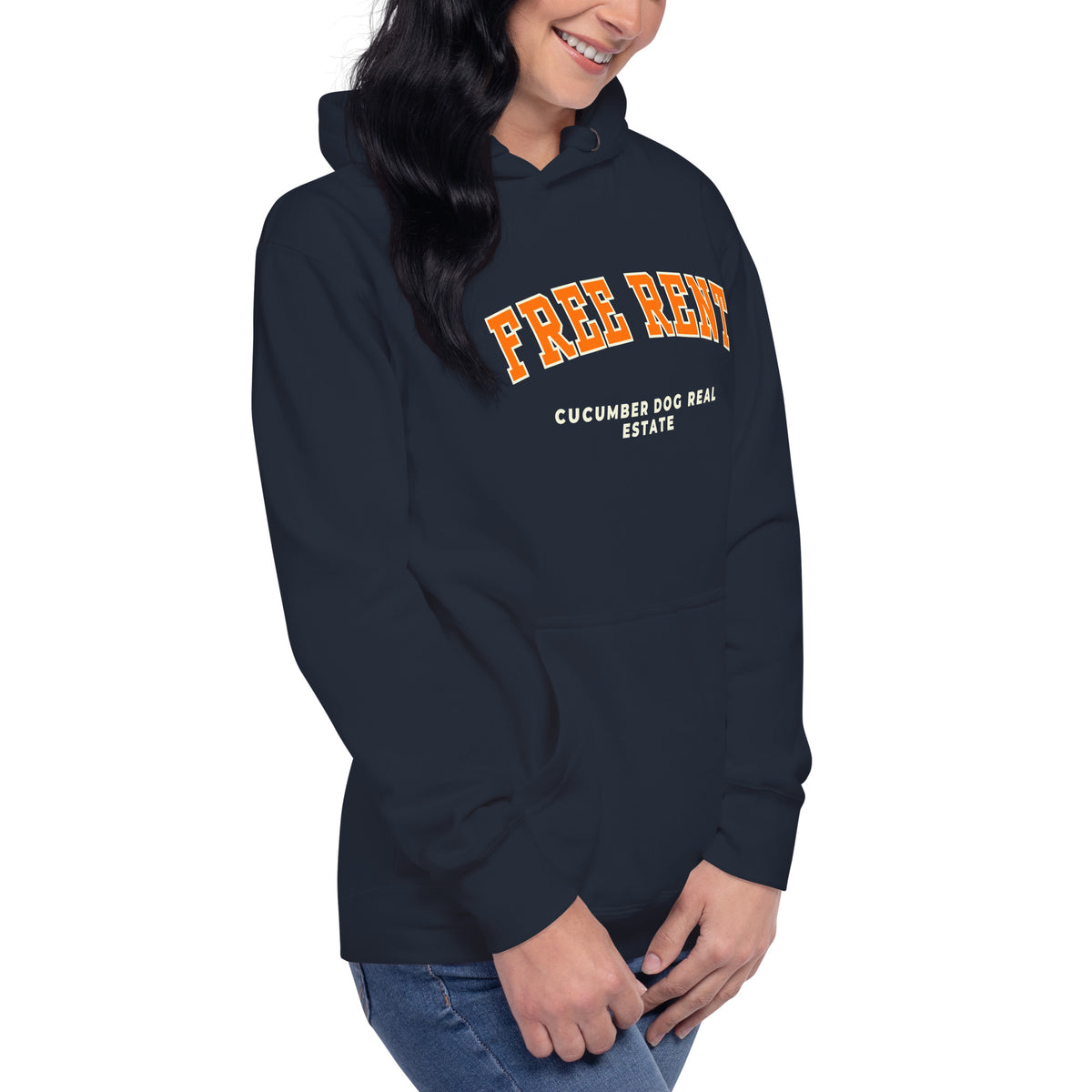 Navy hoodie featuring the text Free Rent in arched orange collegiate typography above Cucumber Dog Real Estate in cream text applied via DTF printing.