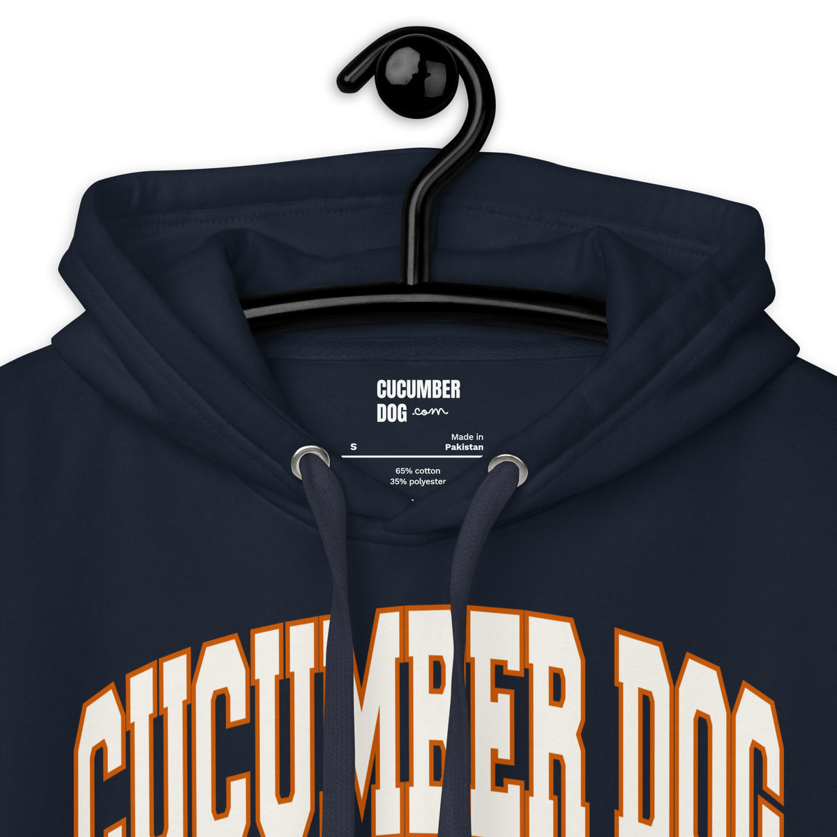 Navy hoodie featuring a collegiate graphic with arched Cucumber Dog and Athletics Dept text in white with orange outlines, Est. 1987, and a track motif framing the CD monogram. also showing the cucumber dog label inside the collar