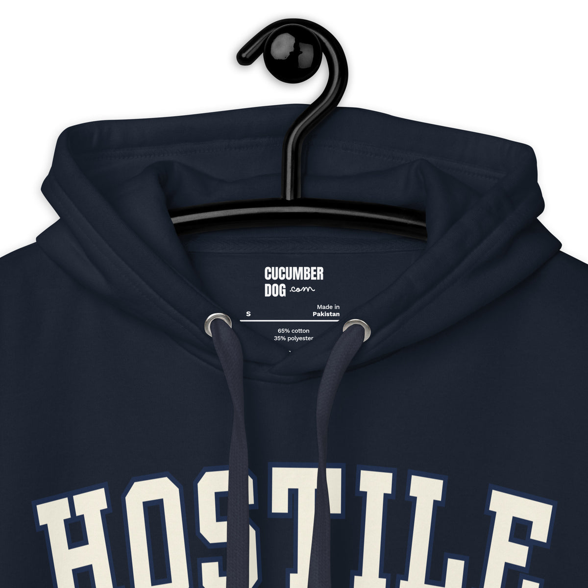 Premium navy blue hoodie featuring a vintage athletic graphic with arched Hostile Athletics text in white, a barbed wire motif, and text reading Train Until The Pug Sings and Cucumber Dog Club.