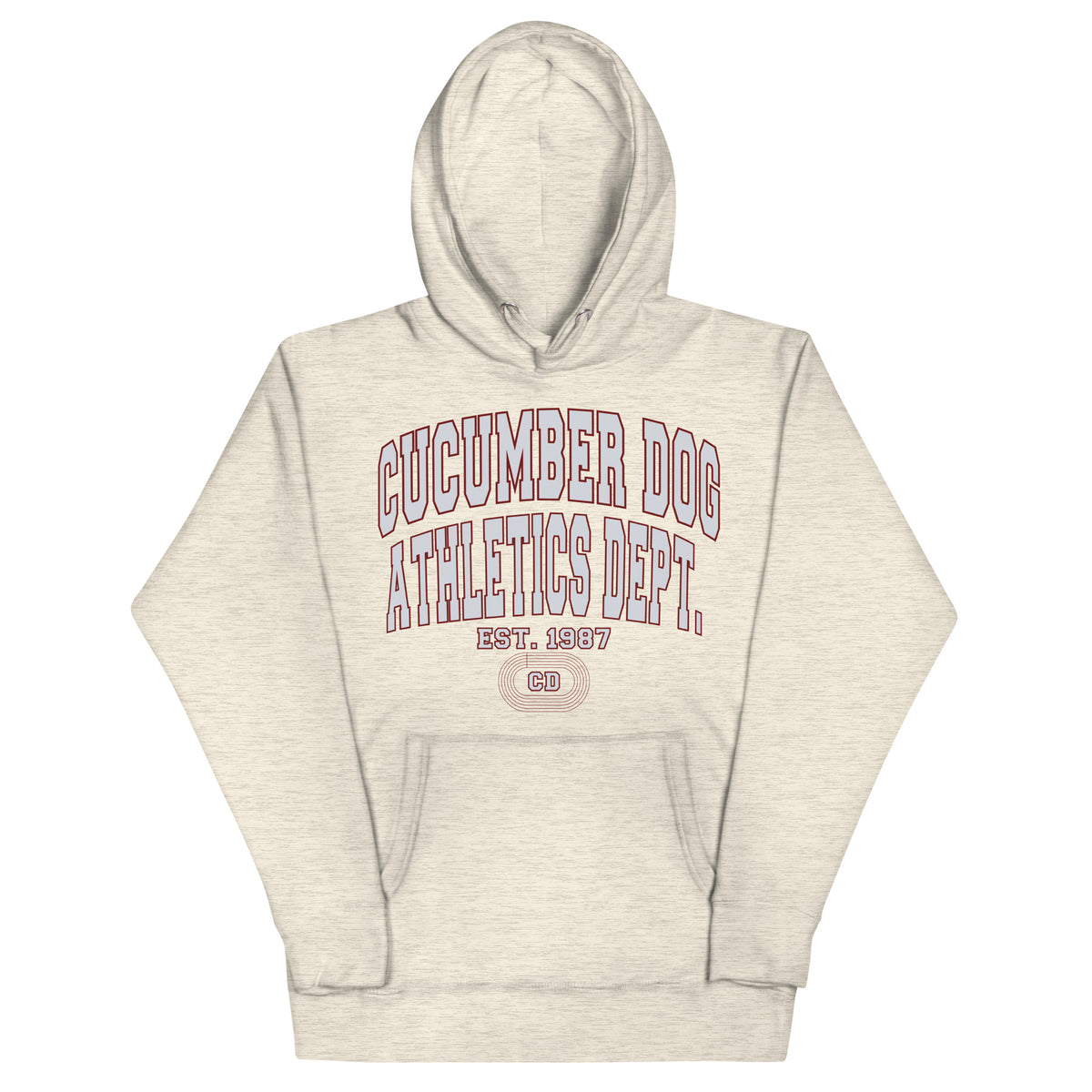 Premium oatmeal heather hoodie featuring a vintage athletic graphic with arched Cucumber Dog and Athletics Dept text in grey block typography with a maroon outline, above Est. 1987 and a track motif framing the CD monogram.