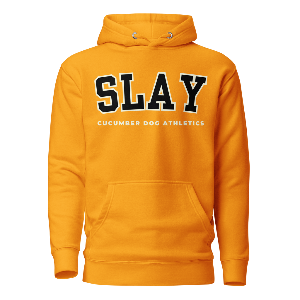 A bright orange pullover hoodie with 'SLAY' printed in black varsity letters with a white outline across the chest, and 'CUCUMBER DOG ATHLETICS' printed in white underneath. The hoodie features a front kangaroo pocket and drawstring hood.