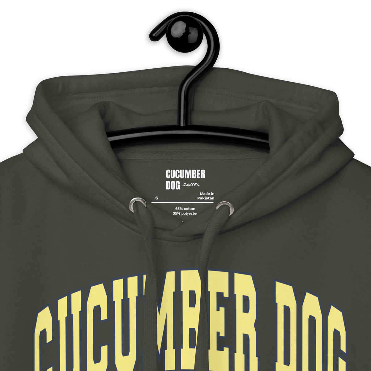 Premium vintage black hoodie featuring a vintage athletic graphic with arched Cucumber Dog and Athletics Dept text in solid butter cream block typography, above Est. 1987 and a track motif framing the CD monogram.