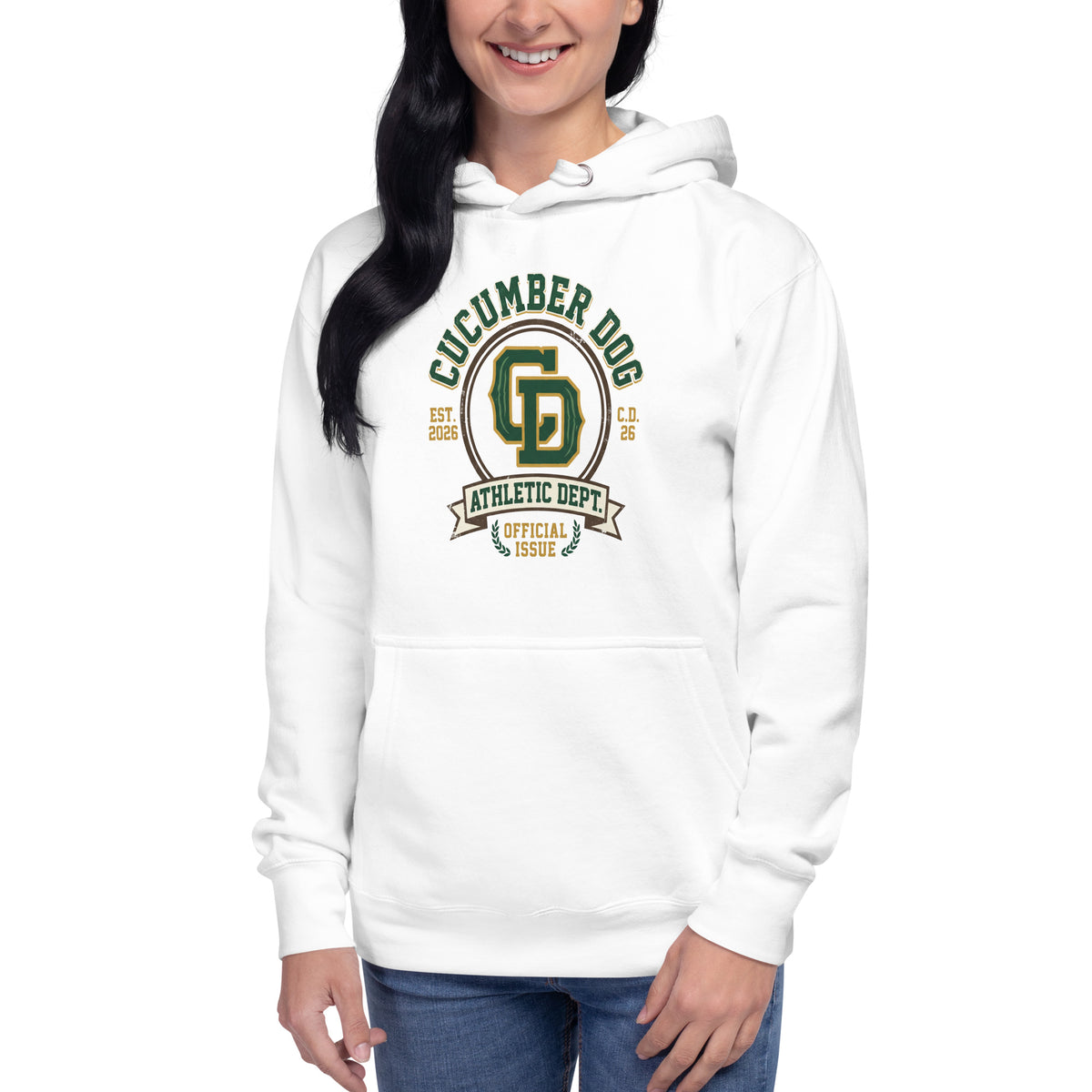 White hoodie featuring a heritage collegiate crest with arched Cucumber Dog text, a central CD monogram, an Athletic Dept banner, and laurel wreaths reading Official Issue in green and gold.