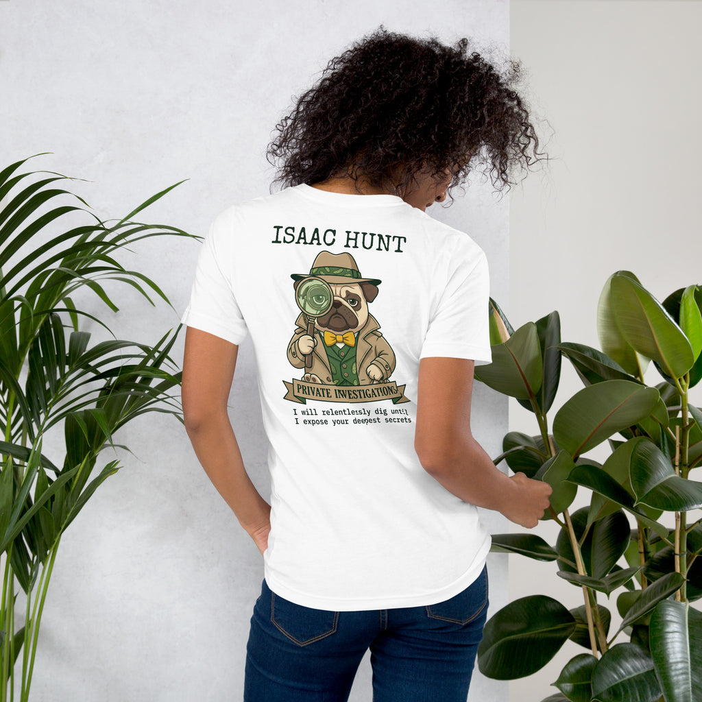 Vintage style illustration on the back of a white t-shirt featuring a pug dog dressed as a detective in a trench coat and fedora, holding a magnifying glass. The bold text above and below reads Isaac Hunt, Private Investigations, I will relentlessly dig until I expose your deepest secrets