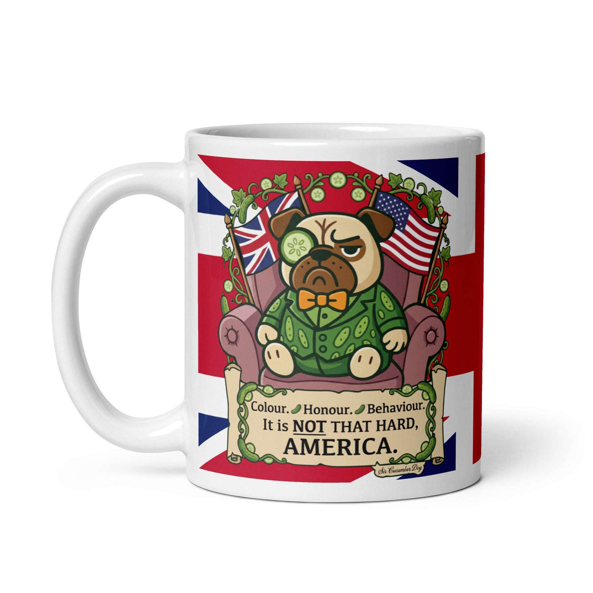 A white ceramic mug with a Union Jack background. Sir Cucumber Dog sits in an armchair between a UK and US flag. Text on a scroll reads Colour, Honour, Behaviour. It is NOT THAT HARD, AMERICA