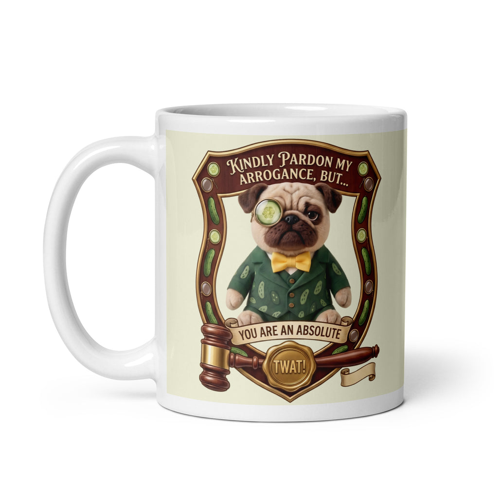 A funny graphic on a ceramic mug featuring Sir Cucumber Dog inside an ornate wooden crest. Below him is a judge's gavel and a gold seal. Text reads: KINDLY PARDON MY ARROGANCE, BUT... YOU ARE AN ABSOLUTE TWAT!