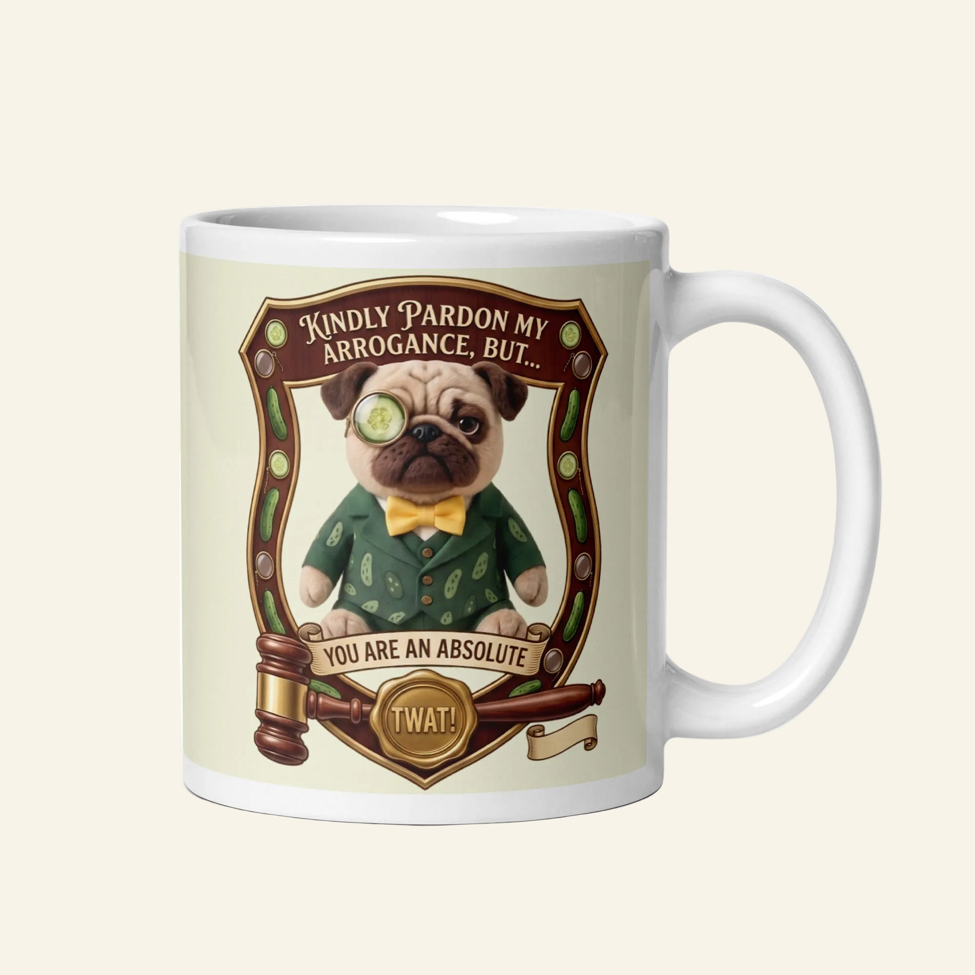 A funny graphic on a ceramic mug featuring Sir Cucumber Dog inside an ornate wooden crest. Below him is a judge's gavel and a gold seal. Text reads: KINDLY PARDON MY ARROGANCE, BUT... YOU ARE AN ABSOLUTE TWAT!
